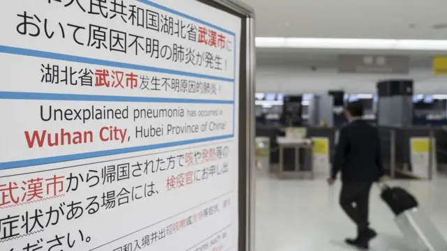 উহান শহরের বিমানবন্দরে সতর্কবাণী