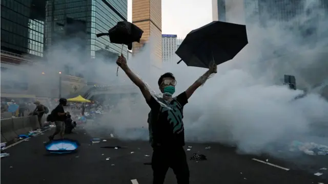 Protester with umbrella in downtown Hong Kong