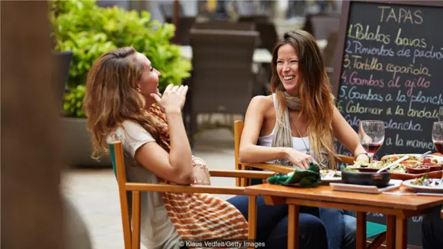 In Spain, the purpose of going out for lunch is catching up with friends or family (Credit: Klaus Vedfelt/Getty Images)
