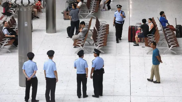 Chinese policemen stand guard at mainland’s jurisdiction inside West Kowloon Terminus at the first day of service of the Hong Kong Section of the Guangzhou-Shenzhen-Hong Kong Express Rail Link, in Hong Kong, China September 23, 2018.