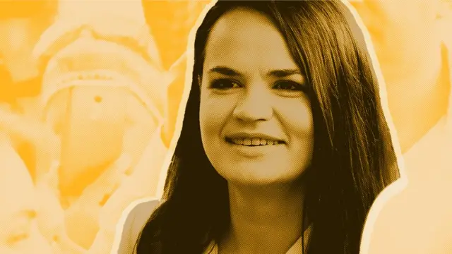 Svetlana Tikhanovskaya smiling at a rally