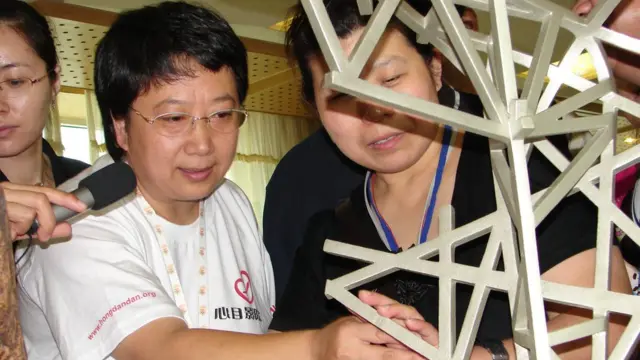 郑晓洁在北京人为盲人开了一家电影院