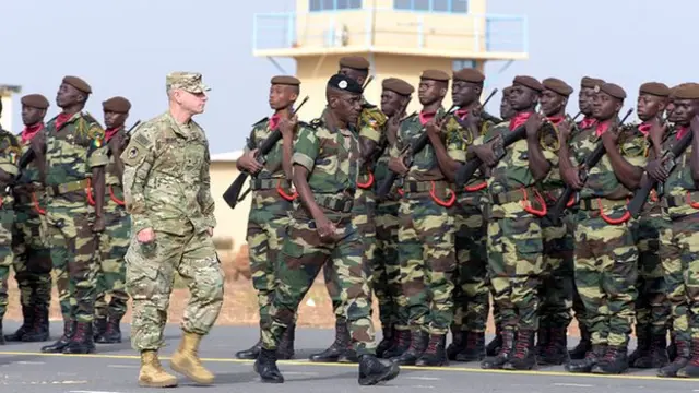 Senegal Army General Amadou Kane and US Army General Donald Bolduc dey check soldiers for Dakar military base.