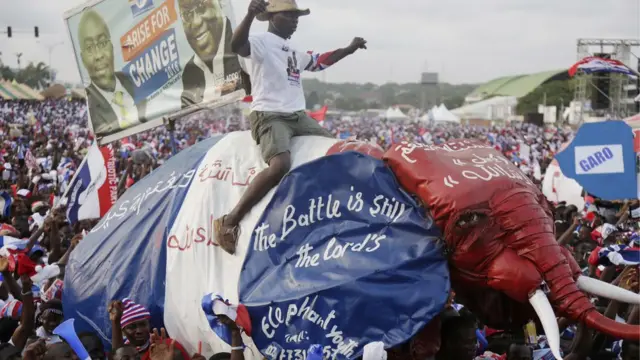Supporters of New Patriotic Party Presidential candidate Nana Akufo-Addo, chant slogans during a presidential election rally in Accra, Ghana, Sunday, Dec. 4, 2016.