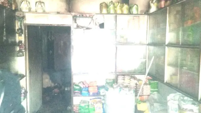 આગ લાગી તે દુકાનની તસવીર