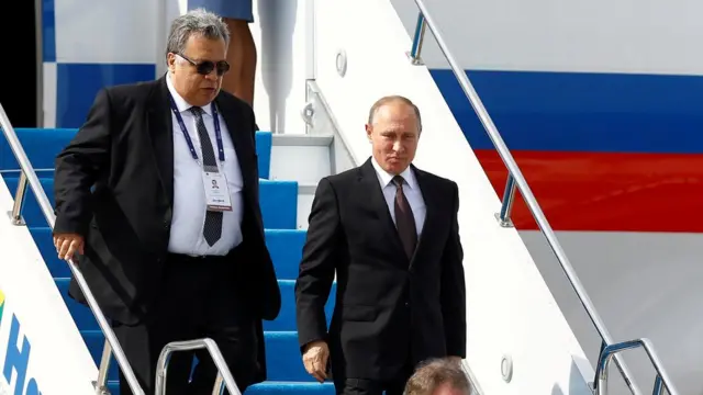 राष्ट्रपति व्लादिमीर पुतिन के साथ एंड्रे कार्लोफ़