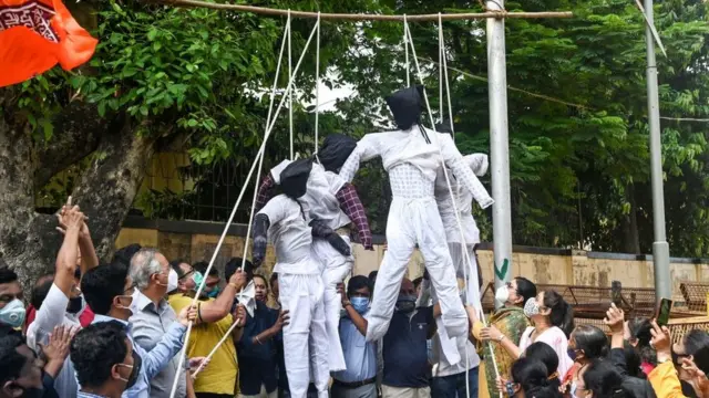 Группа активистов повесила изображения насильников