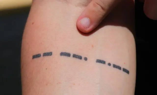 Titanic tattoo: "MGY" in morse code - Titanic's radio call sign