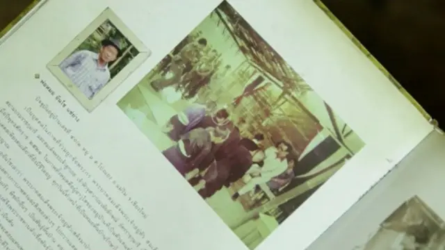 ภาพแคปหน้าจอจากวิดีโอลุงม้งผูกพระกรในหลวง ร. 9