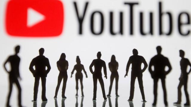 YouTube logo with people in silhouette