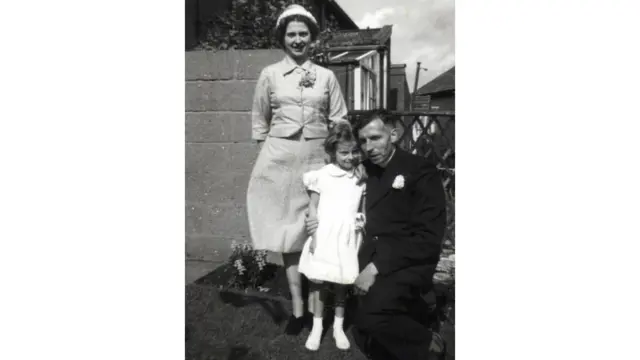 Theresa May as a child with her parents