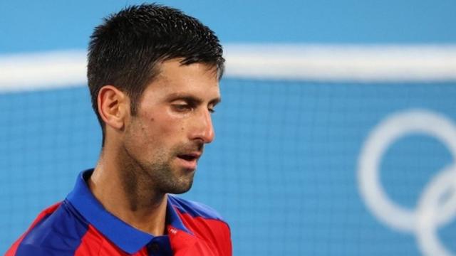 Novak Djokovic looking dejected en route to defeat by Alexander Zverev in the Tokyo Olympic semi-finals