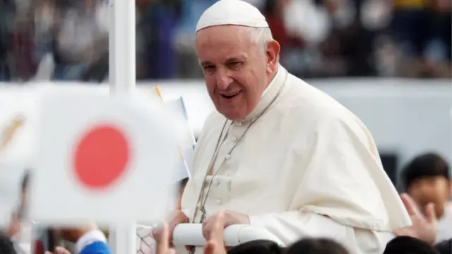 Pope Francis greets wellwishers during a Holy Mass at Nagasaki Baseball Stadium