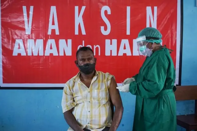 Vaksin, Papua, Covid-19