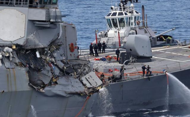 damages on the guided missile destroyer USS Fitzgerald off the Shimoda coast after it collided with a Philippine-flagged container ship