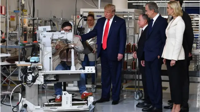 Donald Trump visits a US factory.