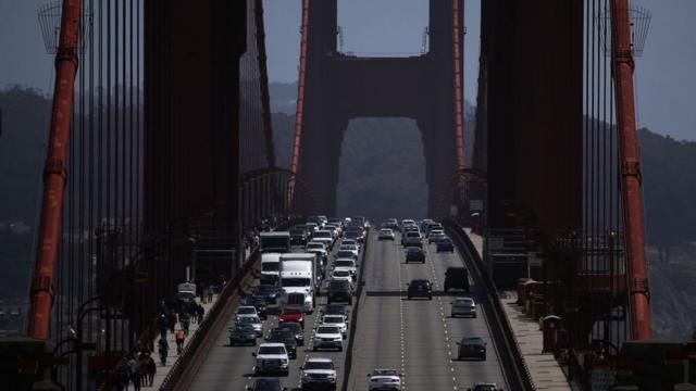 Cars cross the Golden Gate bridge