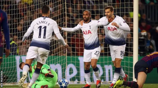 Lucas Moura (centre) celebrates scoring