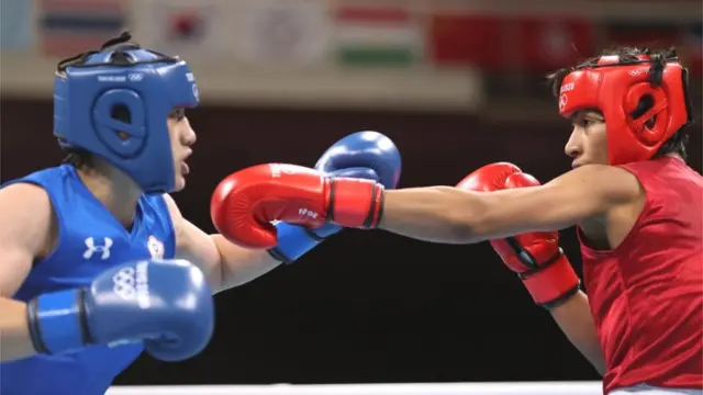 लवलीना (दाएं) ने चीनी ताइपे की निएन-चिन चेन को हराकर सेमीफ़ाइनल में जगह बनाई थी