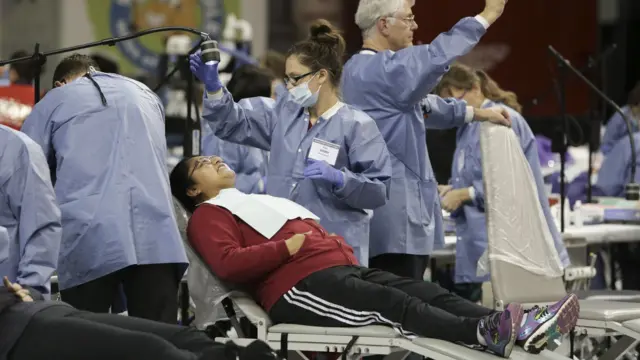 A patient is treated at a special clinic in Seattle, Washington, on 28 October 2016