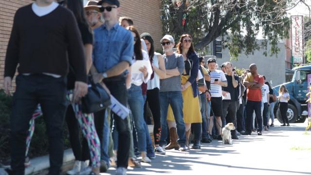 Voters wait in line to cast their ballots in Los Angeles, California