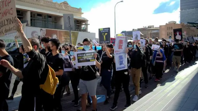 Pro-democracy supporters protesting in Brisbane on 28 July