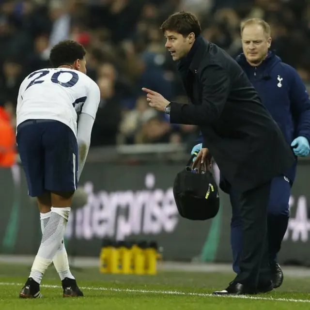 Dele Alli y Mauricio Pochettino