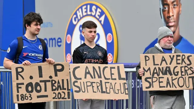 Chelsea fans protest about the European Super League outside Stamford Bridge