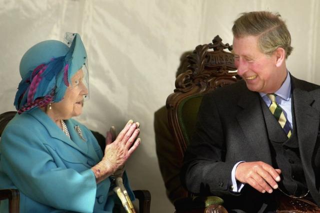 Queen Mother sharing a joke with her grandson the Prince of Wales