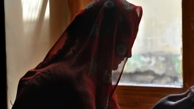 file photo of Afghan woman at a shelter for women