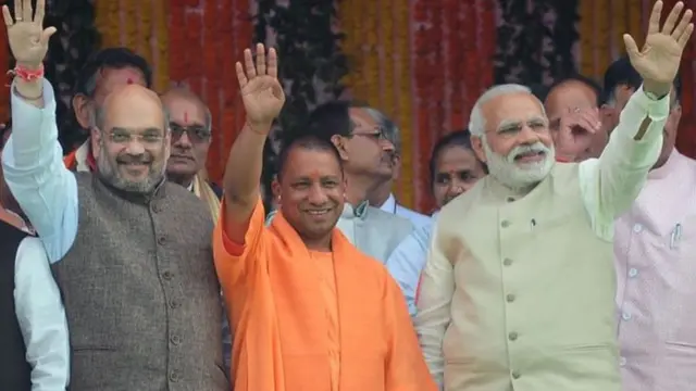 अमित शाह, योगी आदित्यनाथ और नरेंद्र मोदी