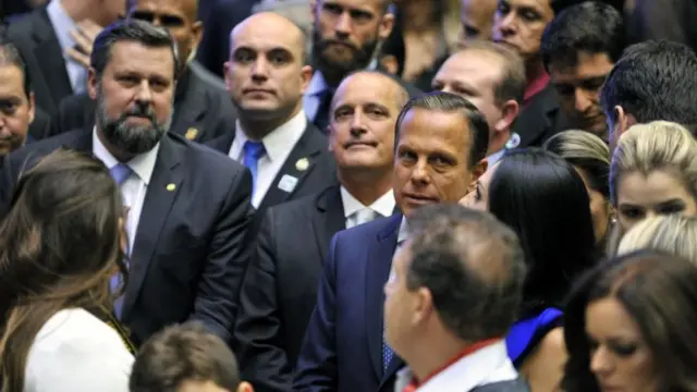 Onyx Lorenzoni (centro, esq.) e João Doria (centro, dir.)