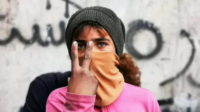 صبي متظاهر في العراق