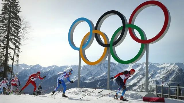 Лыжники