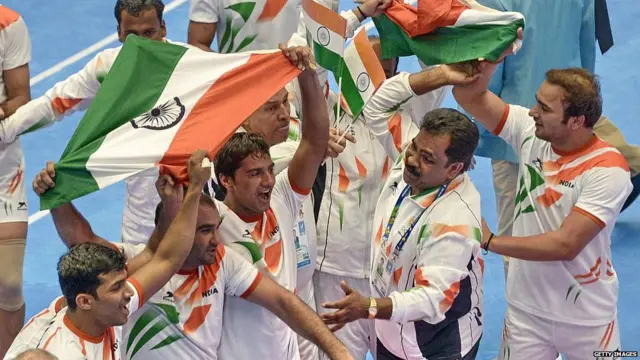 India's team celebrate after defeating Iran's team during their men's kabaddi finals of the 17th Asian Games in Incheon on October 3, 2014