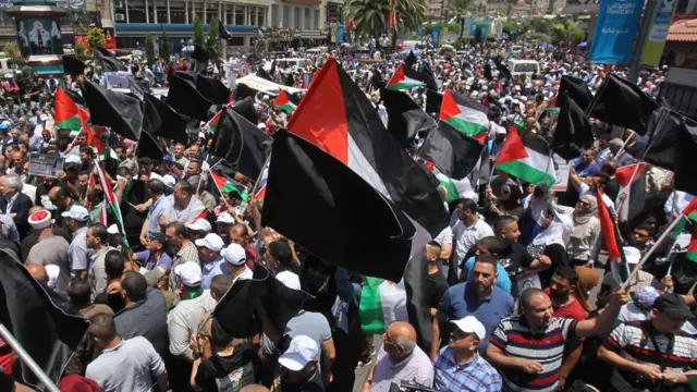 فلسطینیان معترض به گردهمایی منامه در کرانه غربی رود اردن