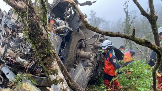 Rescuers at the scene of the emergency landing