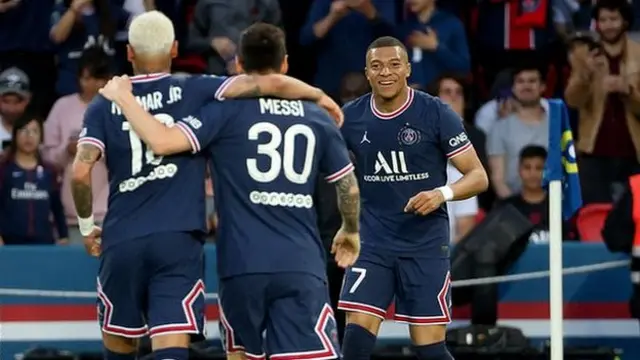 Kylian Mbappe celebrates with Neymar and Lionel Messi