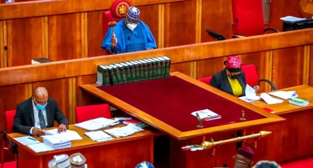Nigeria Senate President, Ahmad Lawan, dey preside over di sitting for di upper chamber of di National Assembly for Abuja on April 27, 2022