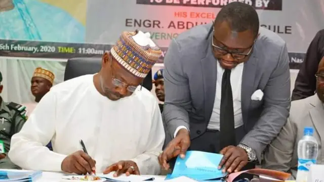 Governor Abdullahi Sule signing di street begging ban into law