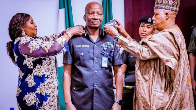 Nigeria Vice President Kashim Shettima decorate di acting Inspector General of Police