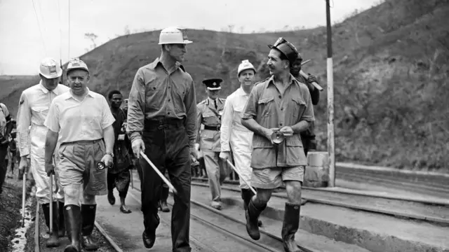 Prince Philip, Duke of Edinburgh (wearing overalls and hemet) visits the Iva Valley mine Enugu, Nigeria. February 1956.