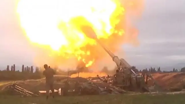 Azeri armed forces firing artillery during clashes between Armenia and Azerbaijan over the territory of Nagorno-Karabakh
