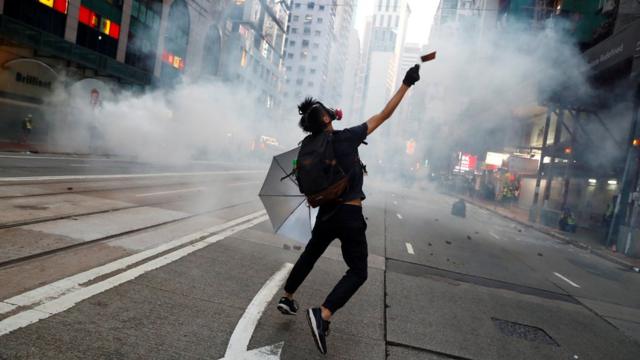 Police fire tear gas in feverish start to 22nd weekend of protests in Hong Kong