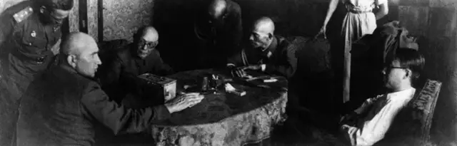 Manchukuo Emperor Puyi (right) being interrogated by Russian General Pritoul (left) after his arrest.