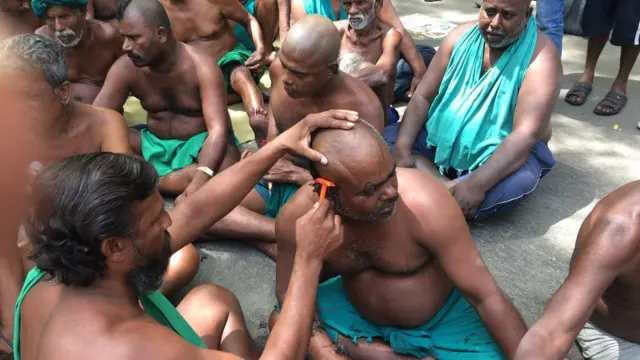 மொட்டையடித்து போராட்டம்