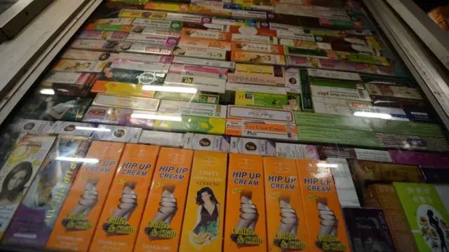 Skin-lightening creams are on display at a beauty shop in Nairobi