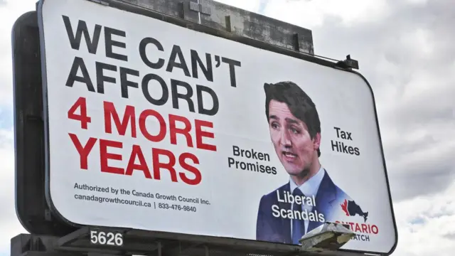 A billboard claiming Canadians 'can't afford four more years' of Justin Trudeau.