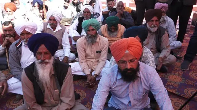 ਵਿਰੋਧ ਵਿੱਚ ਬੈਠੇ ਕਿਸਾਨ