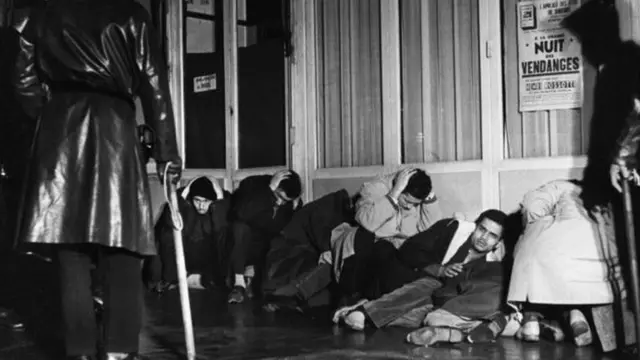 Des Algériens au sol aux mains de la police française